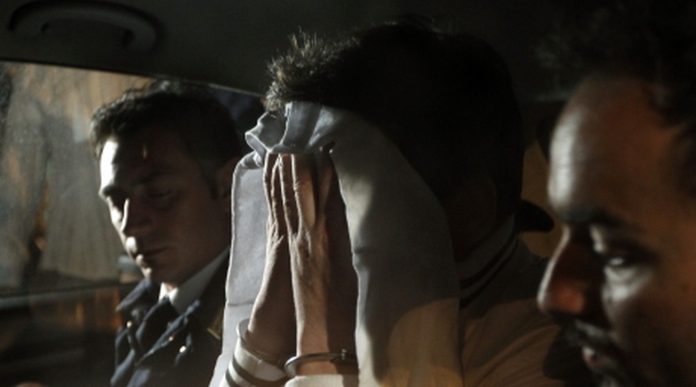 Задержание Валерия Толмачева в аэропорту Рима. Фото REUTERS©